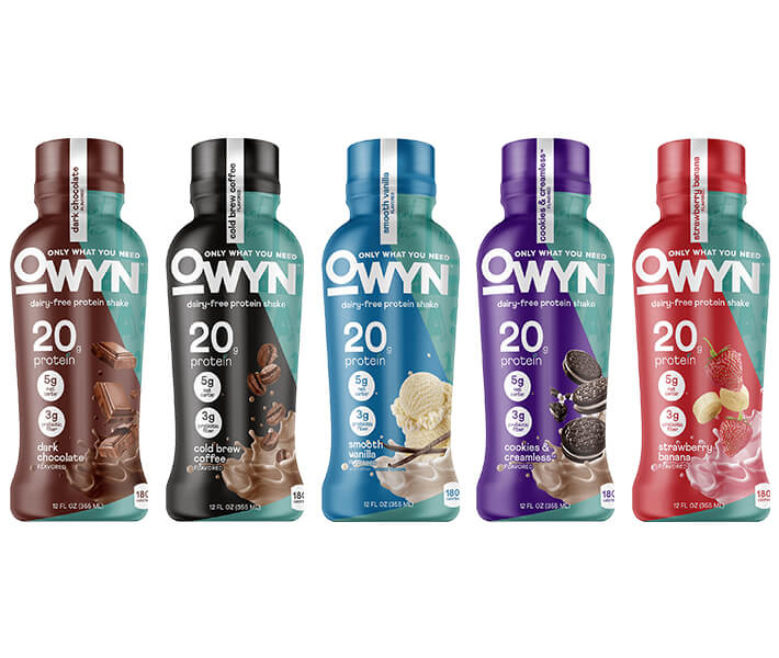 Five OWYN dairy free protein bottles on a white background